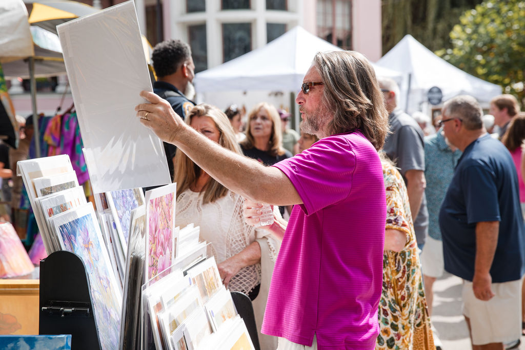 Buying art - event photographer Louisville