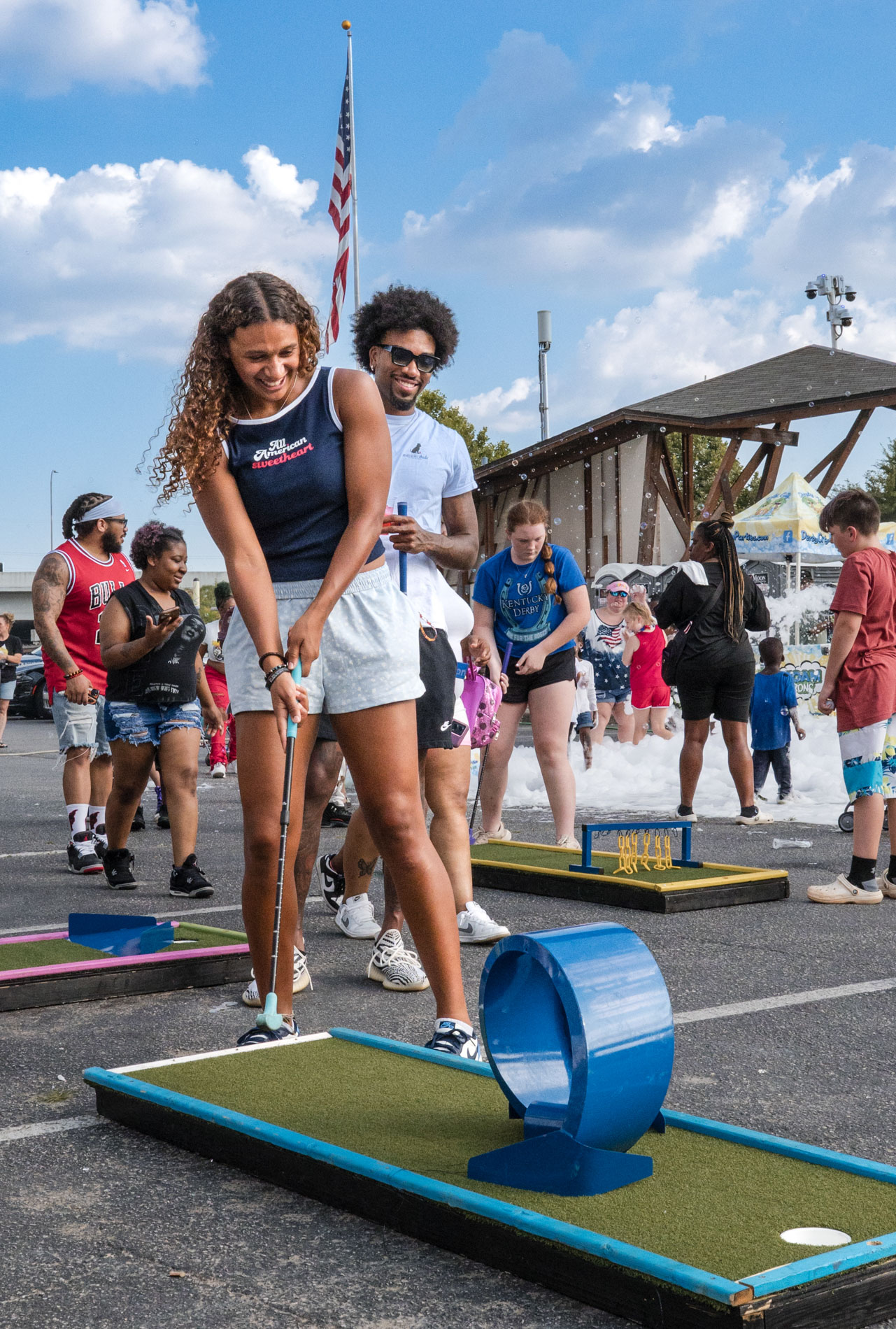 Louisville kids festival — children playing in foam bubbles, Big Four Bridge