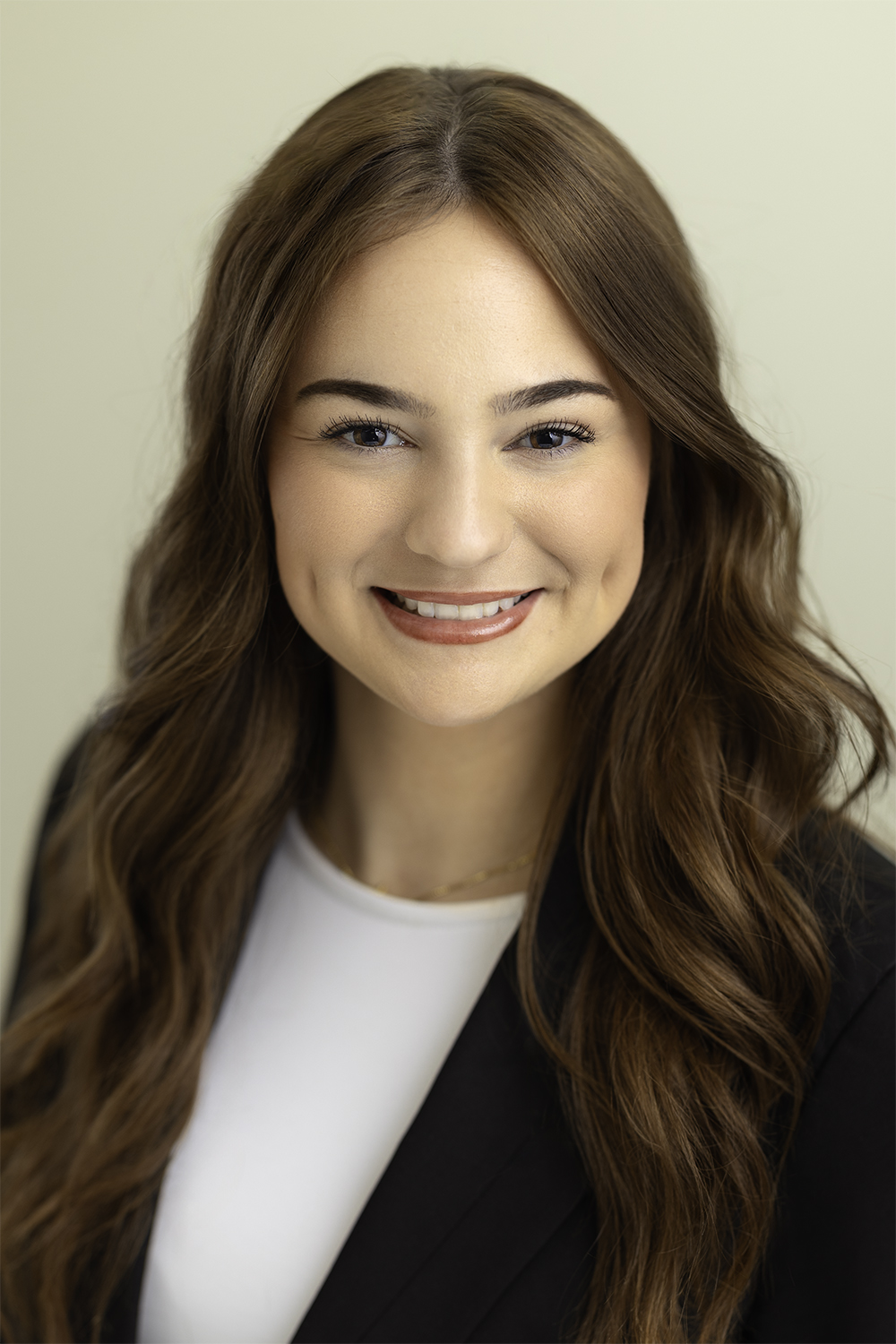 Professional headshot of a woman in a black blazer — Louisville, KY headshot photographer